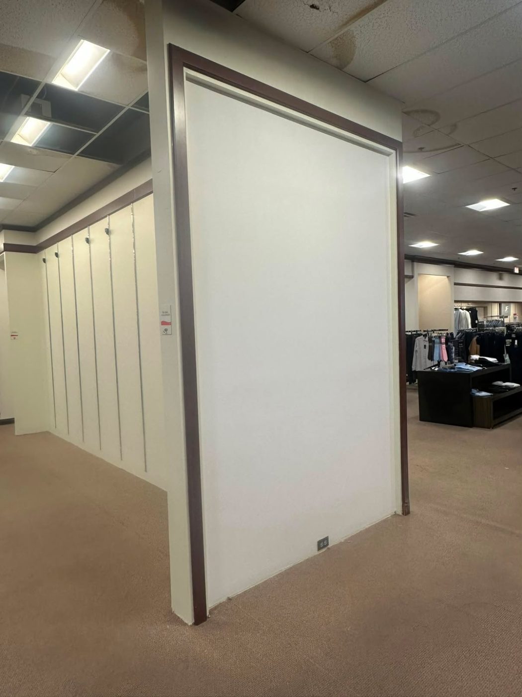 Finished partition wall in a commercial space