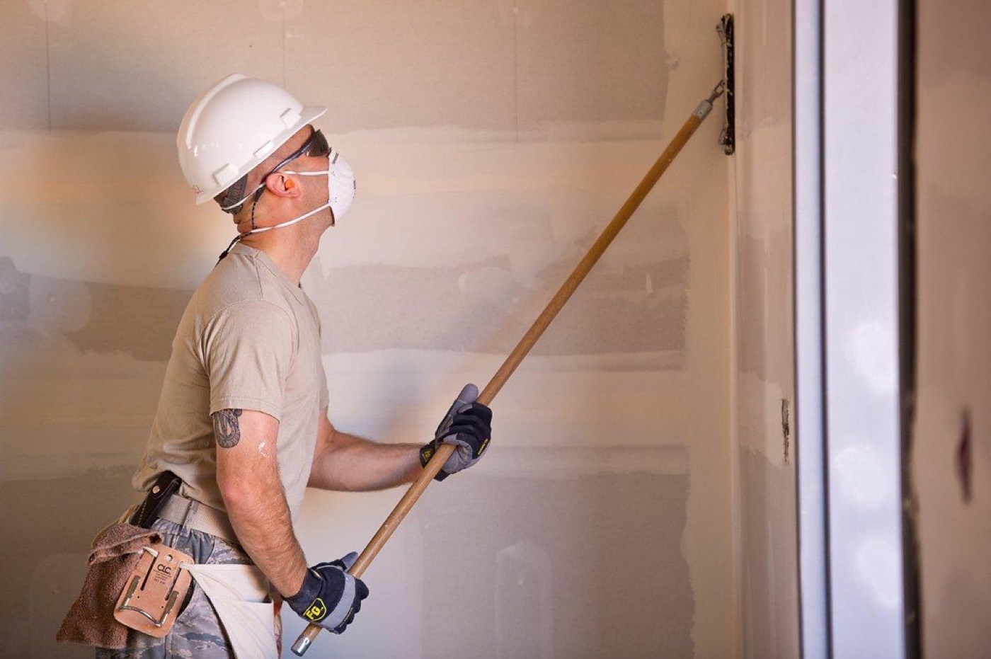 Flex Drywall specialist finishing a wall in Colorado Springs